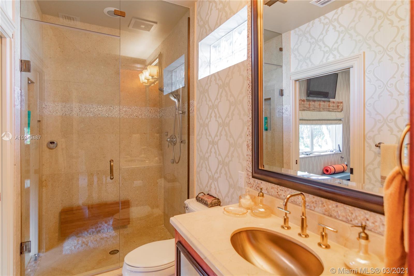 2273 Southwest 132nd Way Davie, FL 33325 - Photo 38 of 48 a bathroom with a sink a toilet and shower