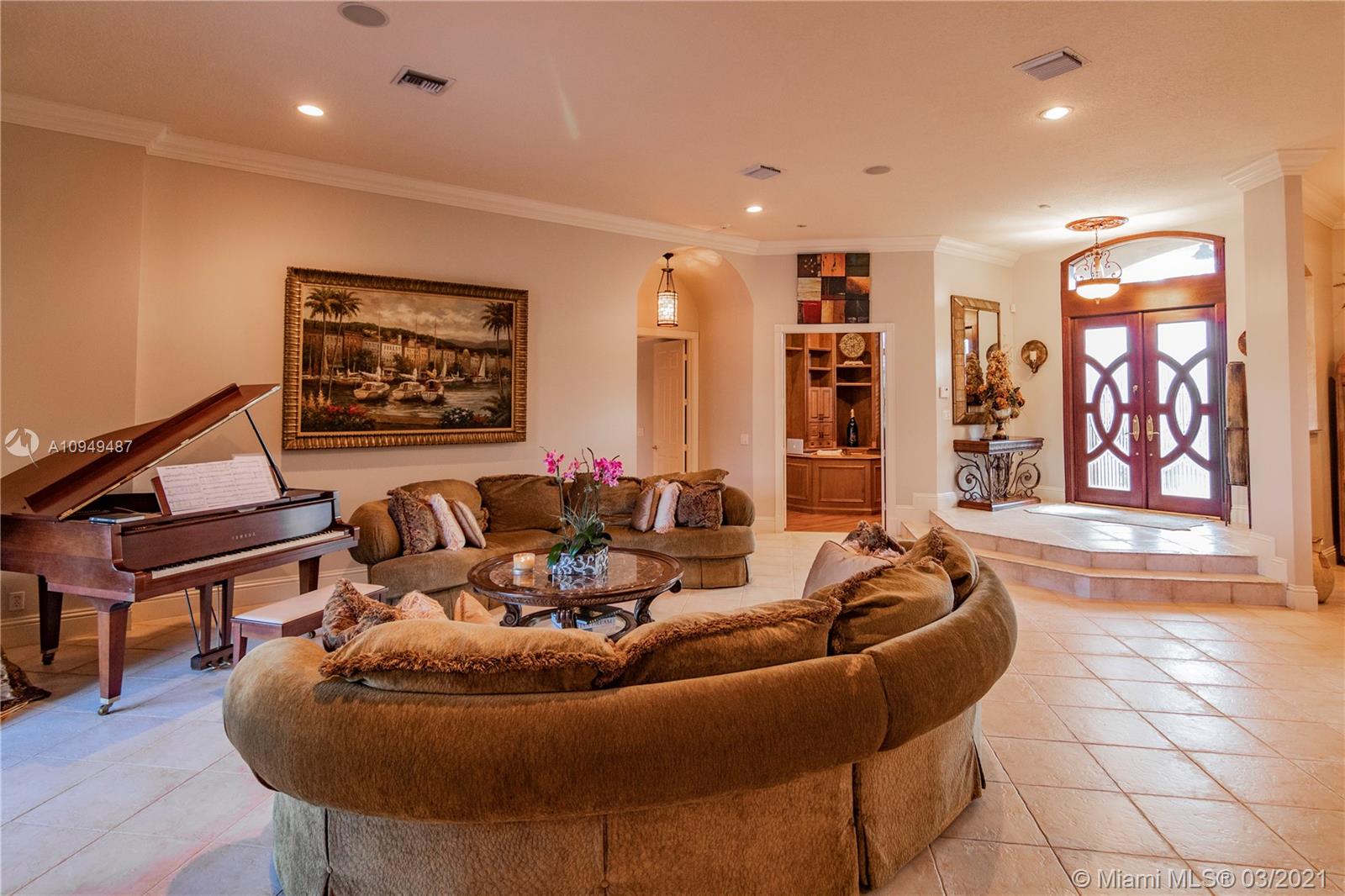 2273 Southwest 132nd Way Davie, FL 33325 - Photo 5 of 48 a living room with furniture and wooden floor