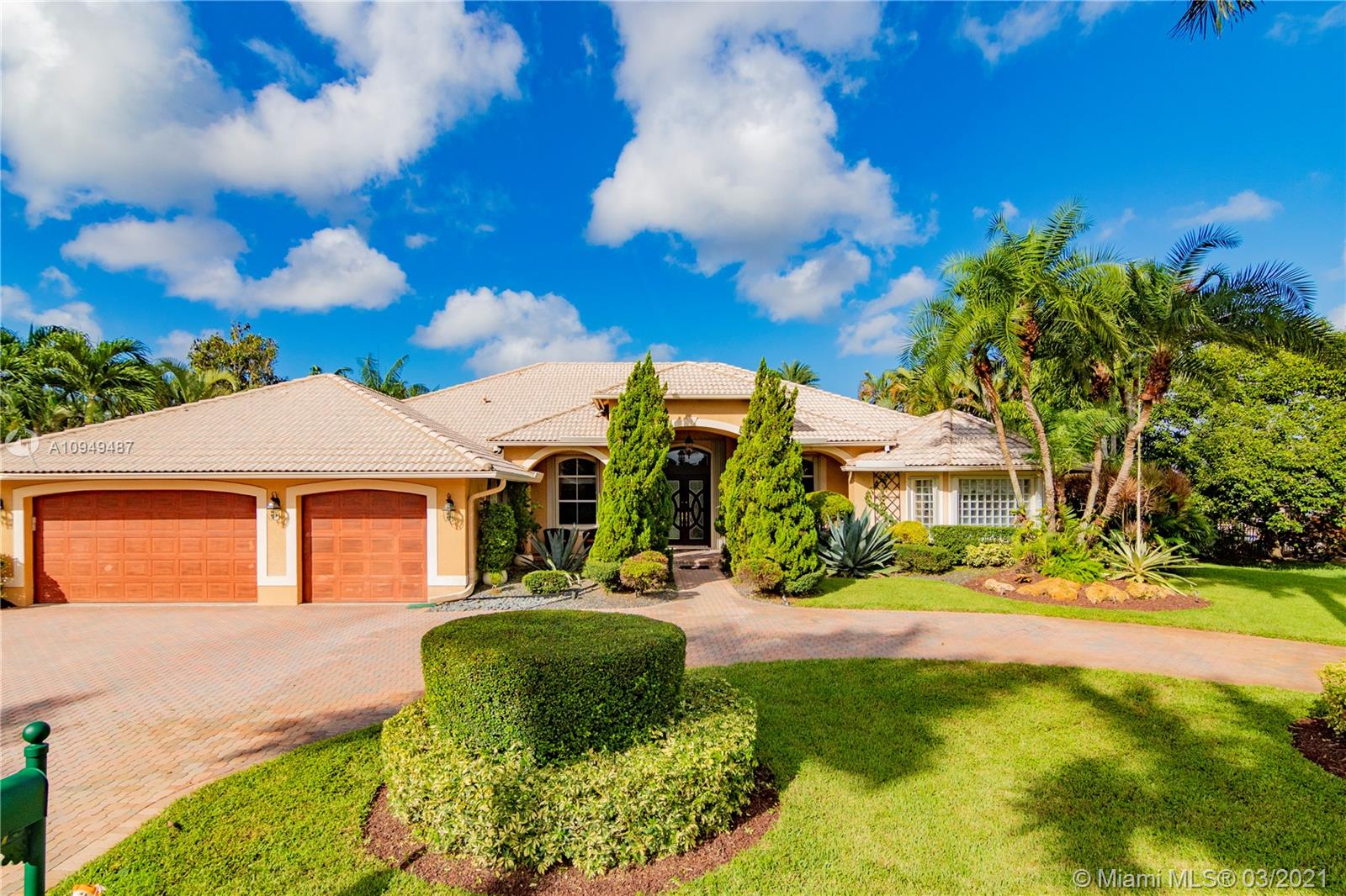 2273 Southwest 132nd Way Davie, FL 33325 - Photo 45 of 48 a front view of a house with a yard