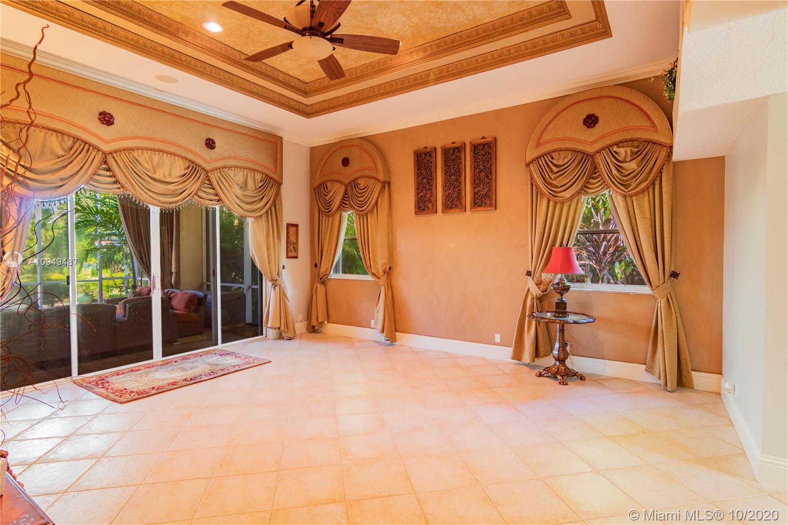 2273 Southwest 132nd Way Davie, FL 33325 - Photo 7 of 48 a view of a garage with rack and furniture