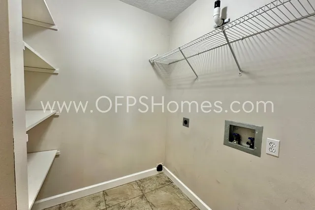 a view of a door with white wall