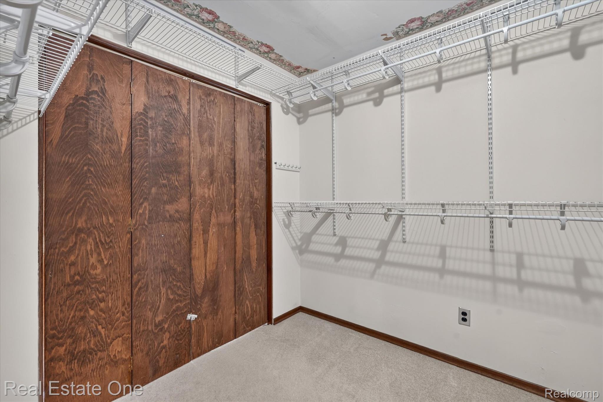 6039 Fish Lake Road Holly, MI 48442 - Photo 21 of 64 Primary Bedroom walk in closet.