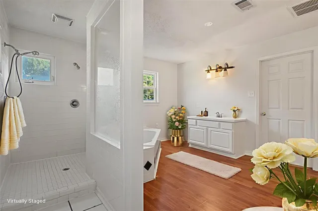a bathroom with a sink and mirror