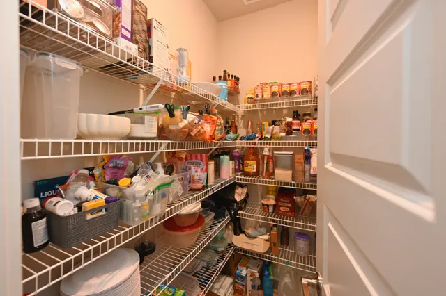 a view of a balcony with an outdoor seating