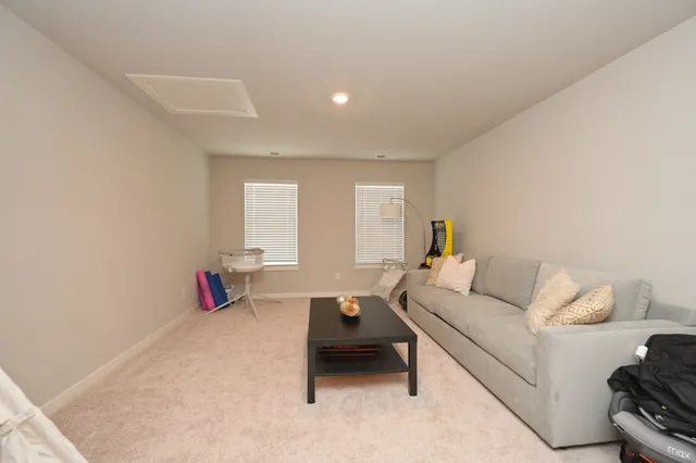 a living room with furniture and a couch