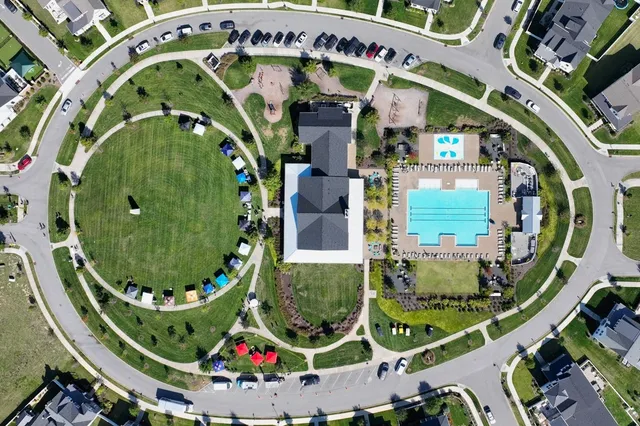 an aerial view of a highlighted house