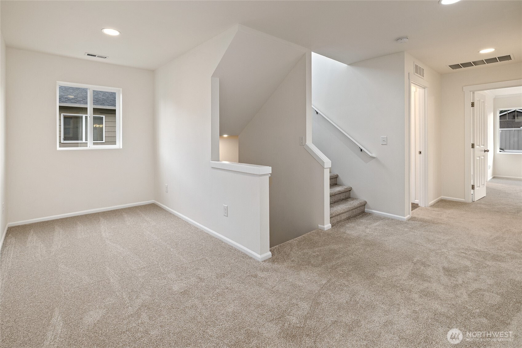 8117 175th St Court East Puyallup, WA 98375 - Photo 16 of 40 a view of an empty room with a window