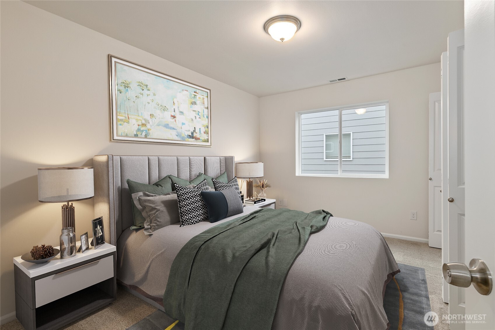 8117 175th St Court East Puyallup, WA 98375 - Photo 23 of 40 a bed room with double bed and a night stand