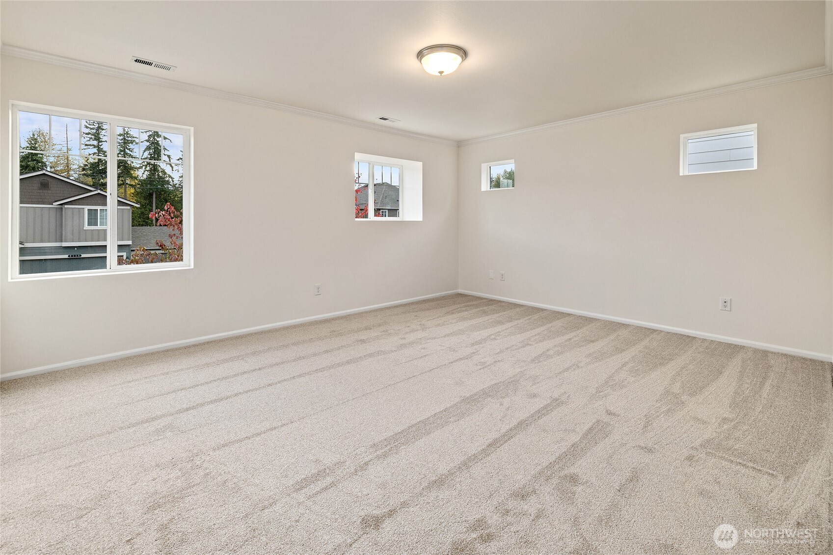 8117 175th St Court East Puyallup, WA 98375 - Photo 29 of 40 a view of an empty room with a window
