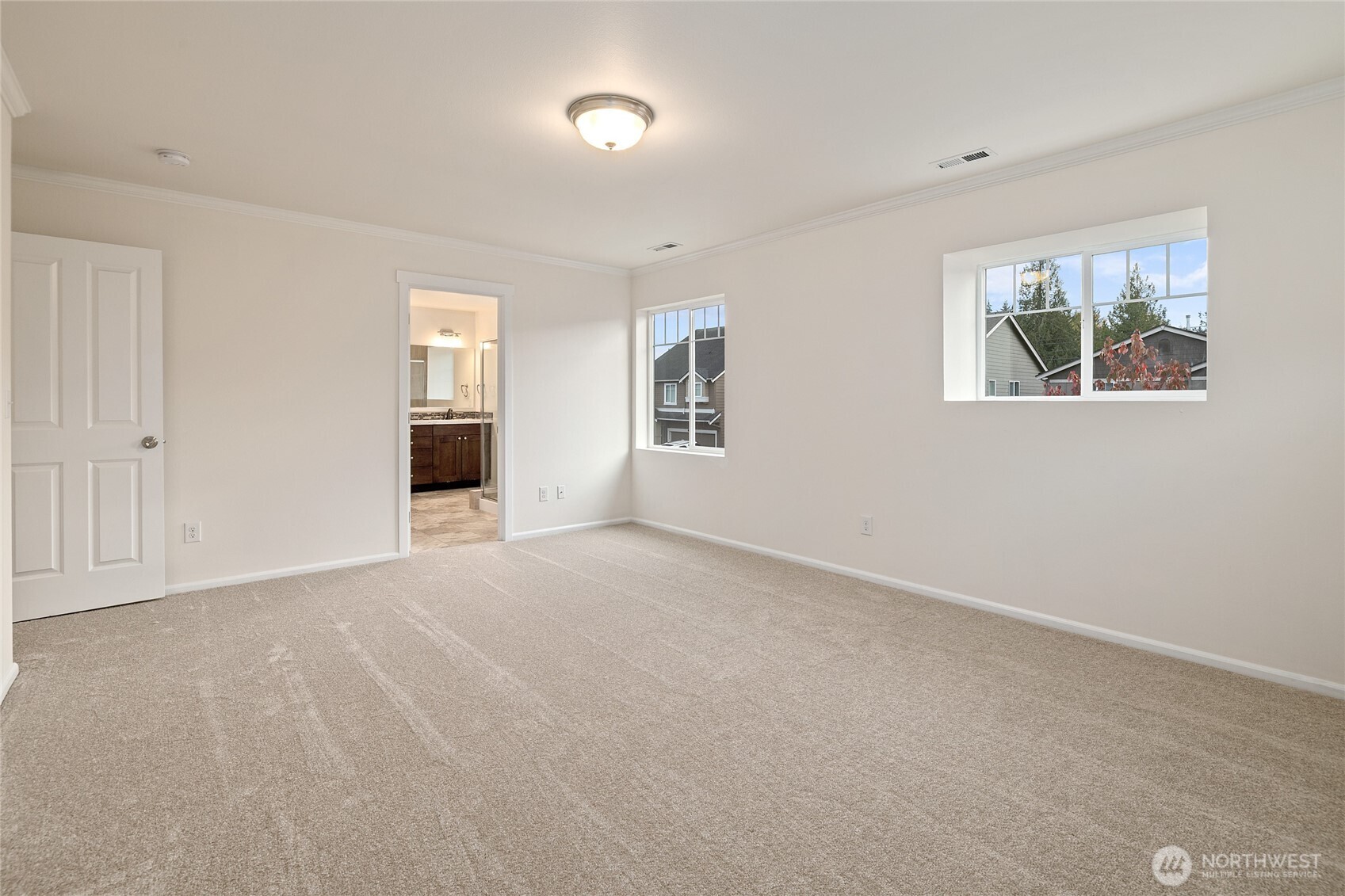 8117 175th St Court East Puyallup, WA 98375 - Photo 30 of 40 a view of an empty room with a window