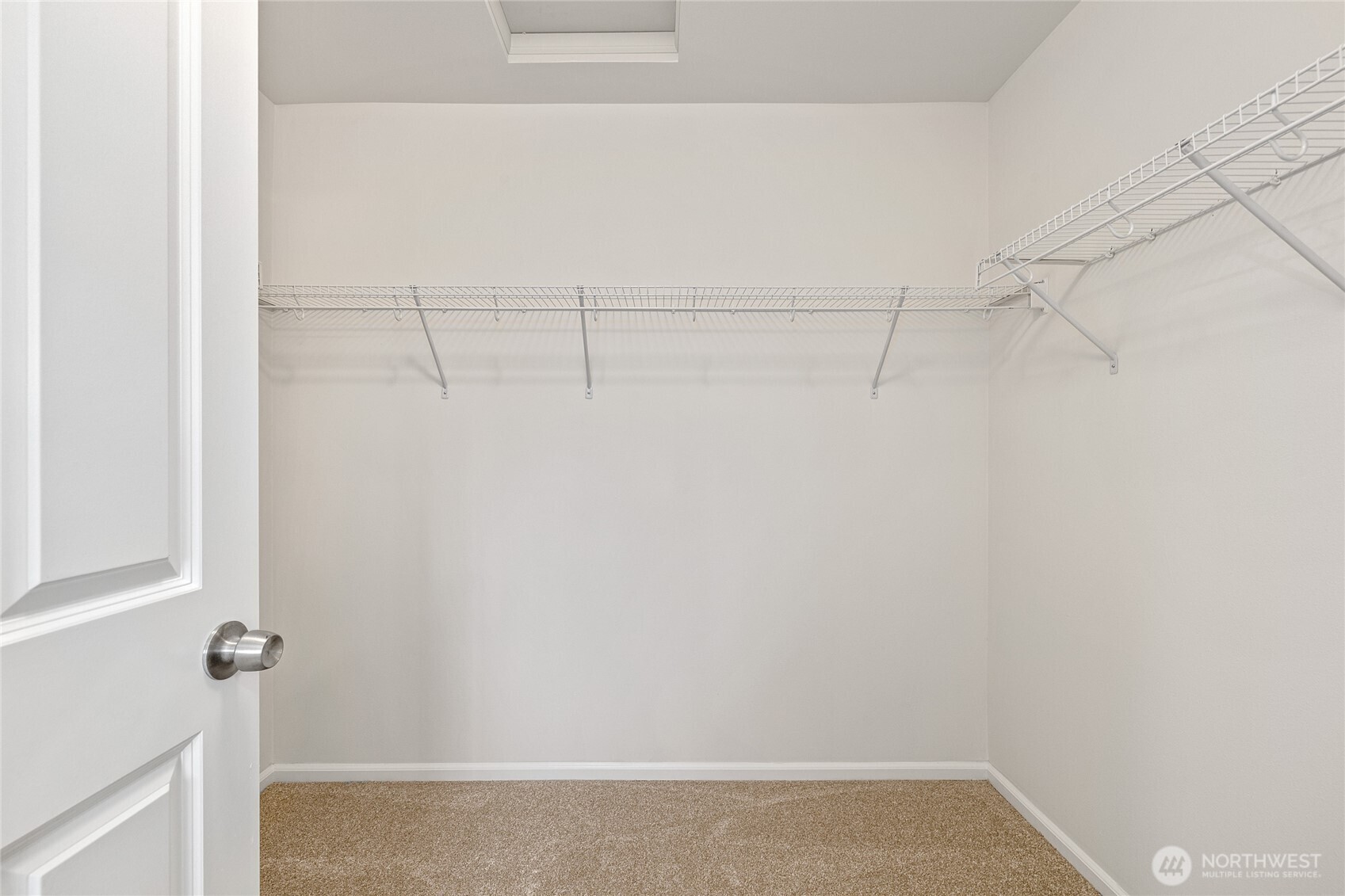 8117 175th St Court East Puyallup, WA 98375 - Photo 32 of 40 a view of small space with racks on the wall