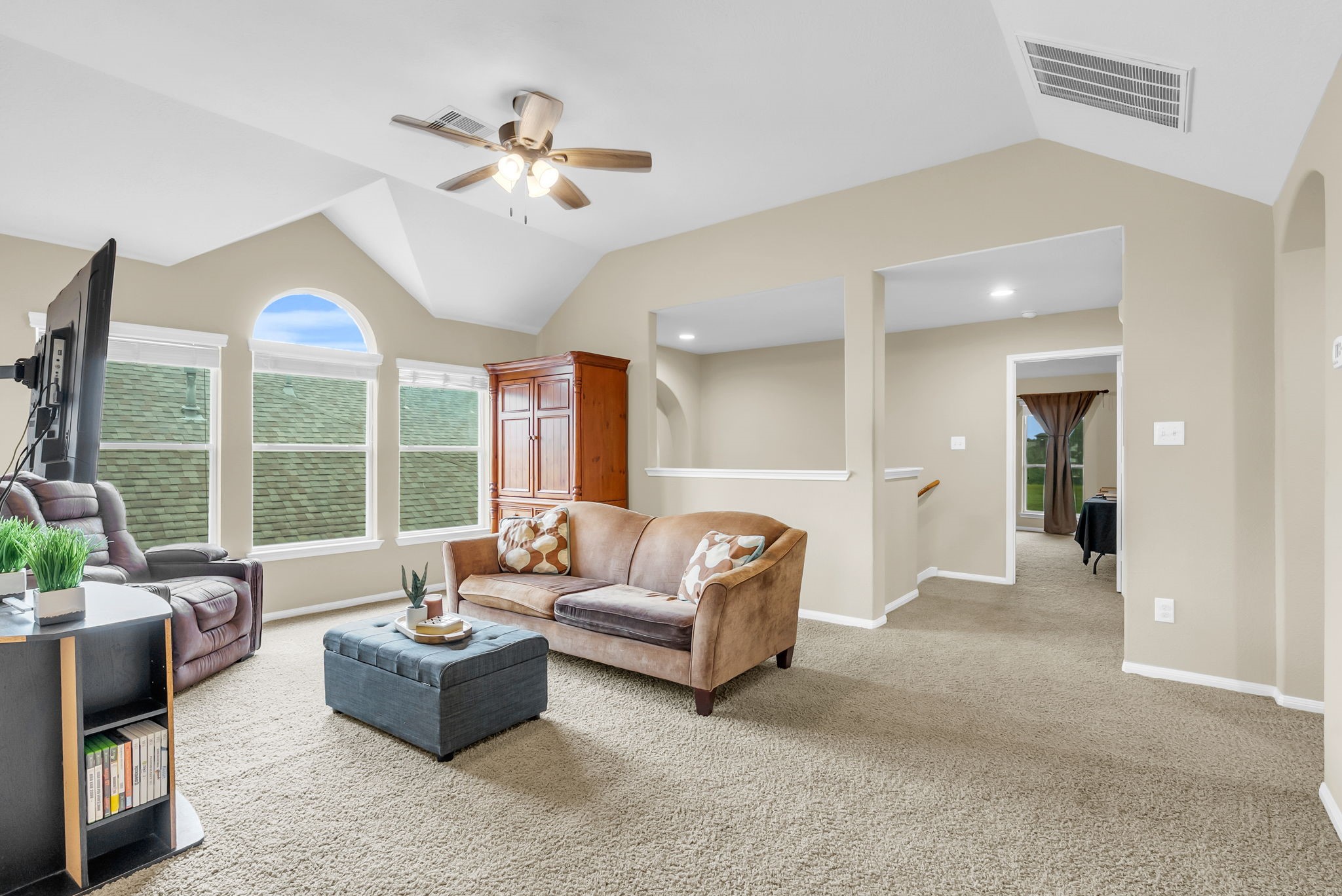 16619 Dover Mills Drive Spring, TX 77379 - Photo 24 of 49 a living room with furniture and a large window