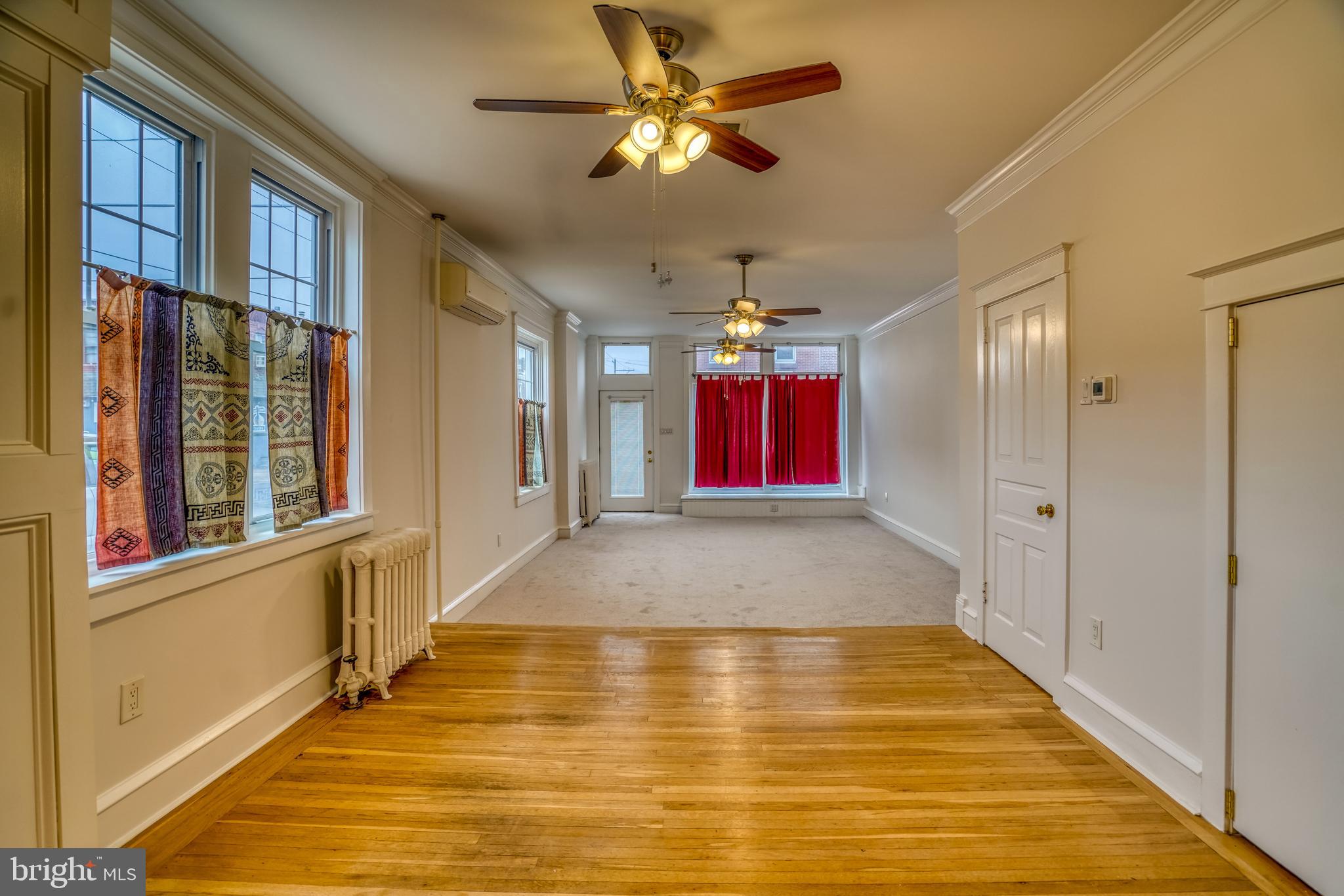 4501 Edgemont Street Philadelphia, PA 19137 - Photo 11 of 40 a view of interior space with wooden floor and a chandelier