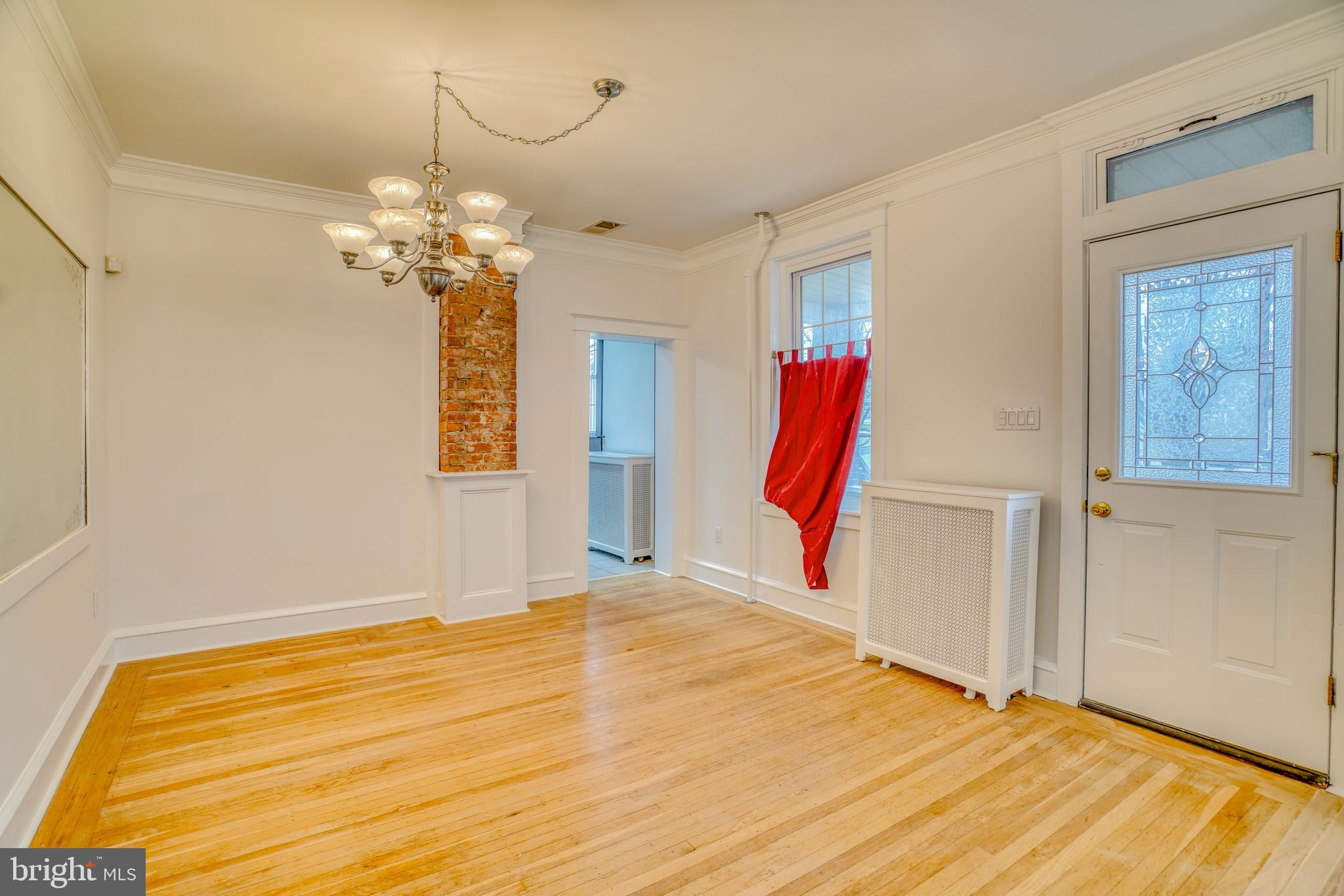 4501 Edgemont Street Philadelphia, PA 19137 - Photo 12 of 40 a view of a bedroom with wooden floor and ceiling fan