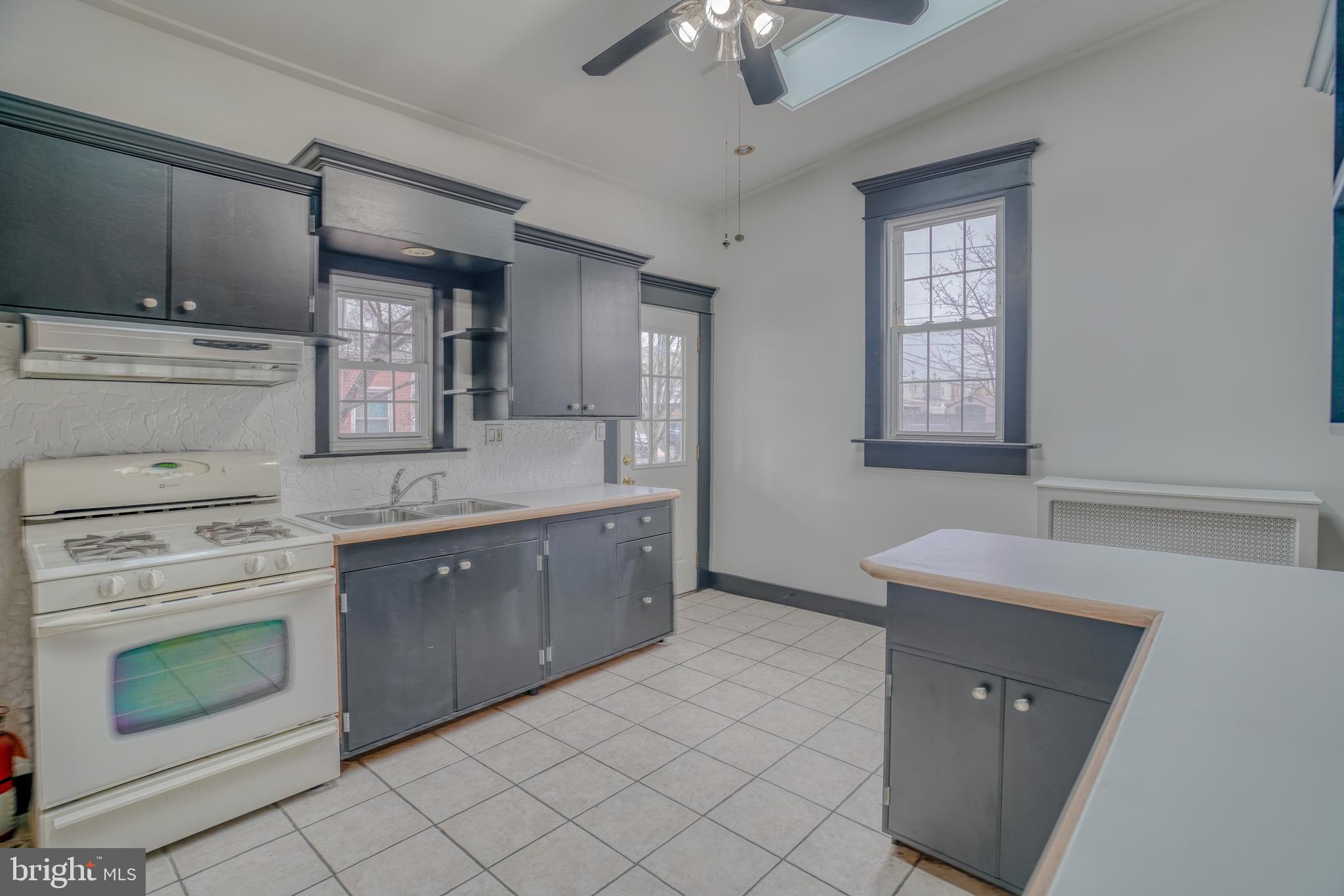4501 Edgemont Street Philadelphia, PA 19137 - Photo 13 of 40 a spacious bathroom with a sink double vanity and a mirror