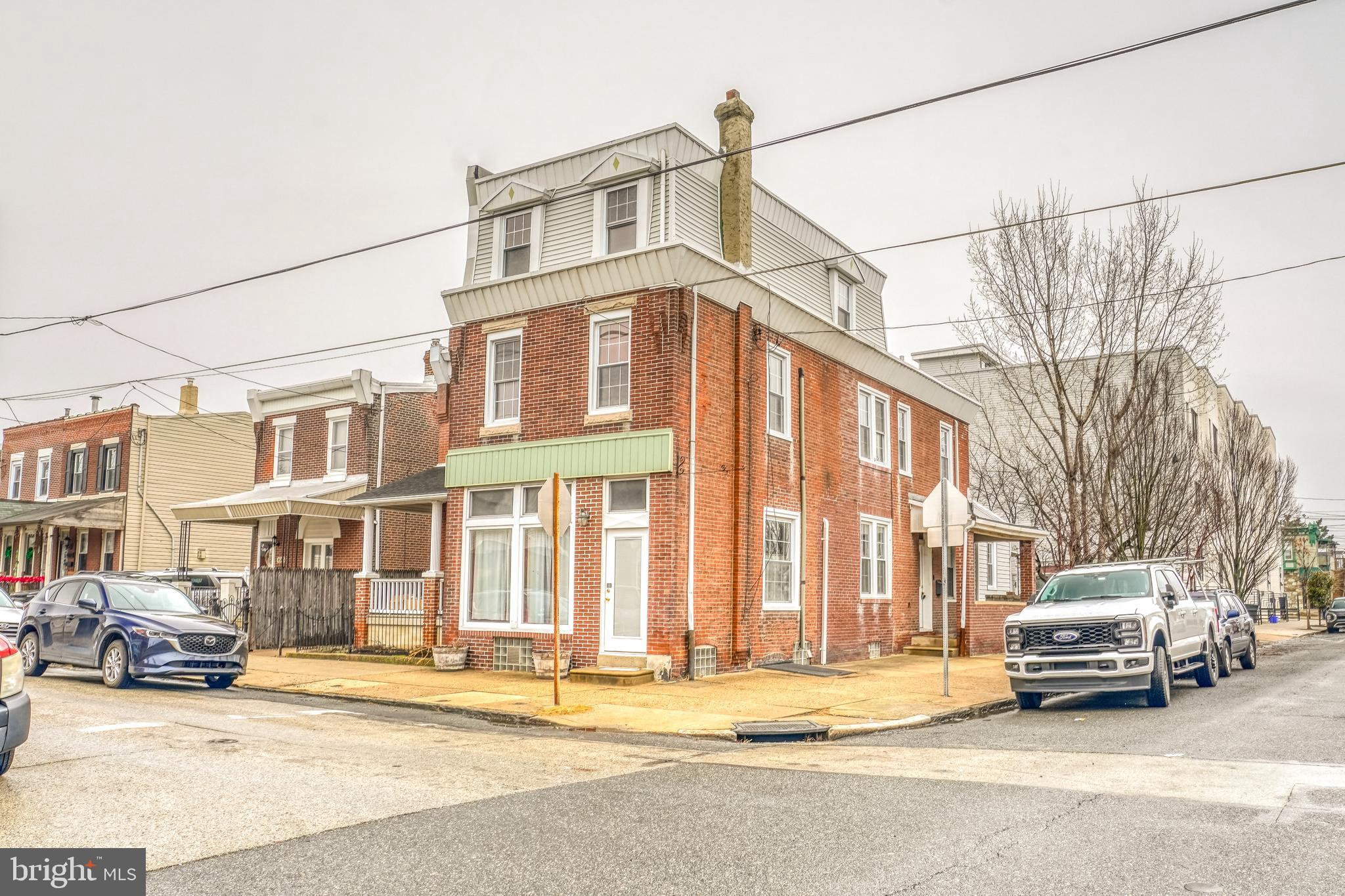 4501 Edgemont Street Philadelphia, PA 19137 - Photo 2 of 40 a white building that has a lots of windows in it