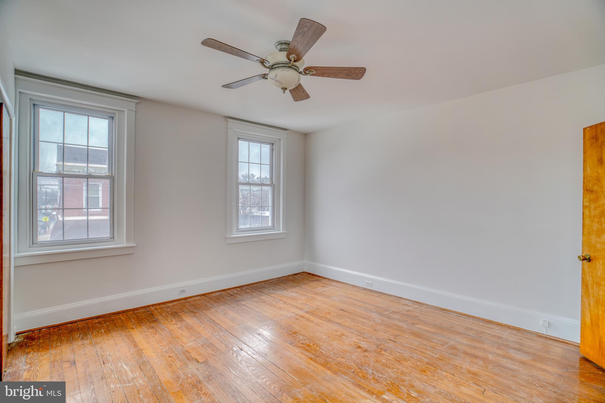 4501 Edgemont Street Philadelphia, PA 19137 - Photo 24 of 40 a view of empty room with wooden floor and fan