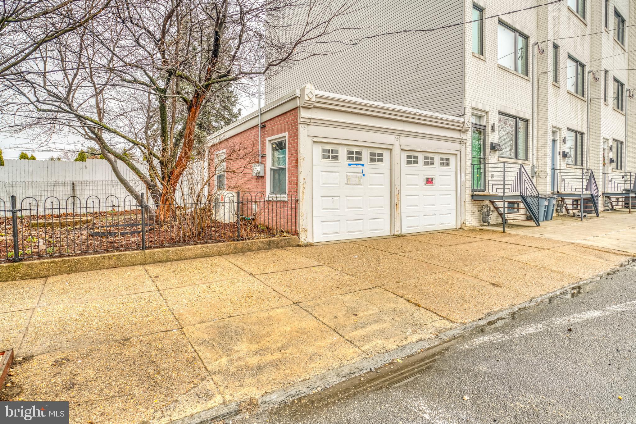 4501 Edgemont Street Philadelphia, PA 19137 - Photo 3 of 40 a view of a building with snow on the road