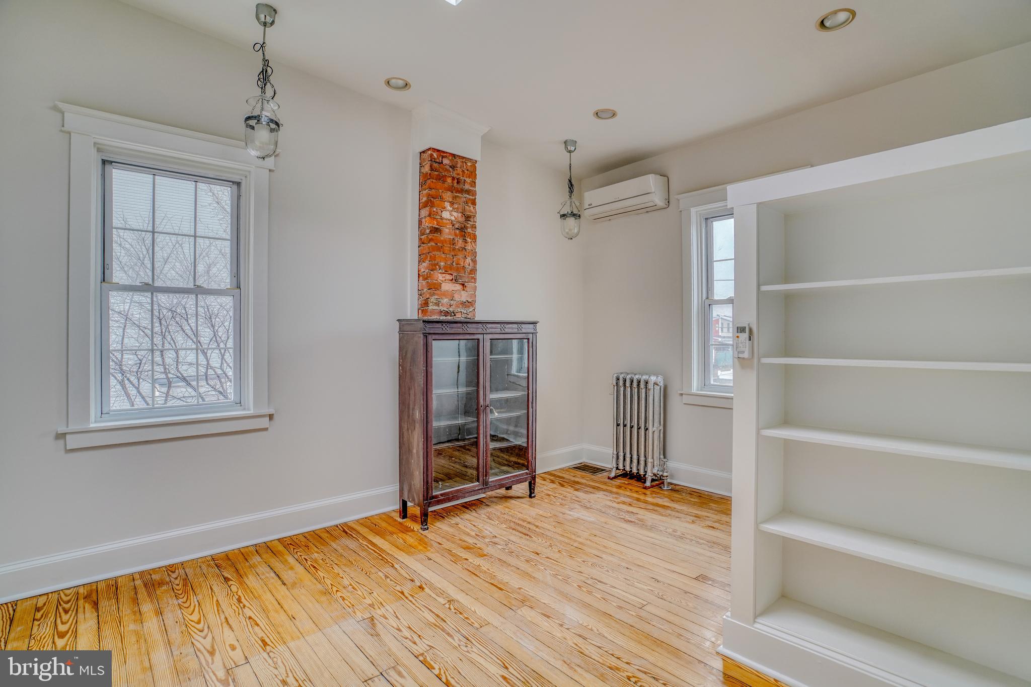 4501 Edgemont Street Philadelphia, PA 19137 - Photo 35 of 40 a view of room with wooden floor and windows