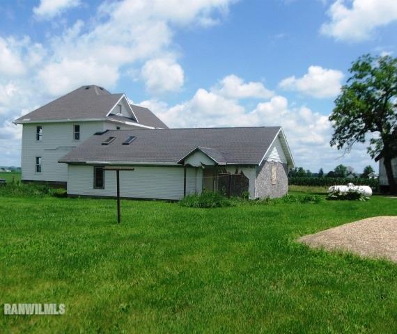 16747 West White Oak Road Forreston, IL 61030 - Photo 17 of 24 a house view with a garden space