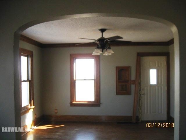16747 West White Oak Road Forreston, IL 61030 - Photo 2 of 24 wooden floor in an empty room with a window