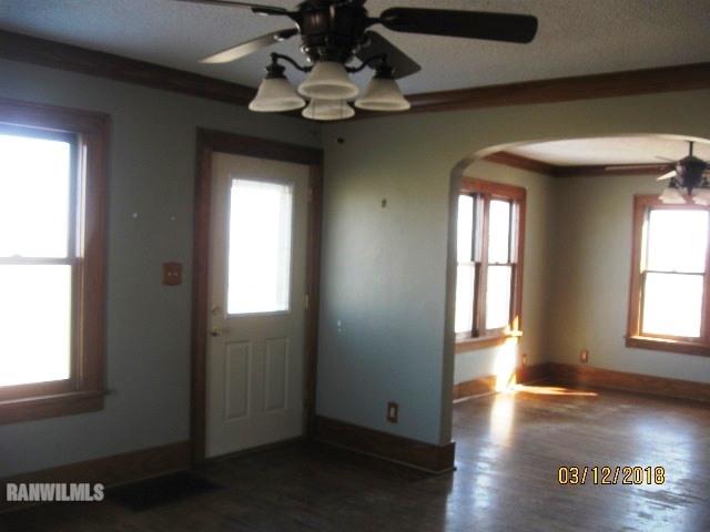16747 West White Oak Road Forreston, IL 61030 - Photo 3 of 24 a view of an empty room with a window