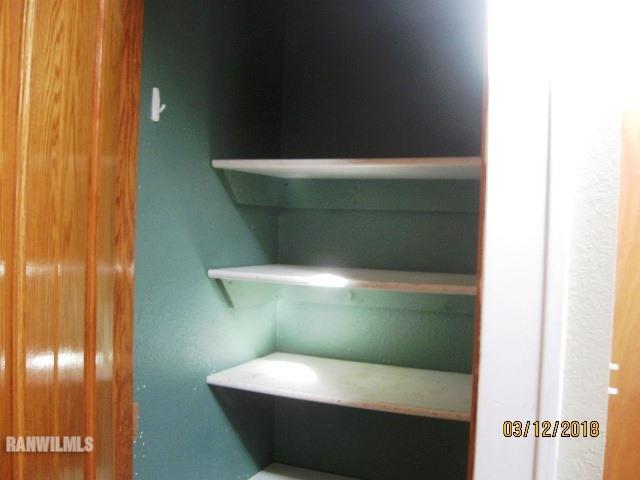 16747 West White Oak Road Forreston, IL 61030 - Photo 6 of 24 a bathroom with a sink and toilet