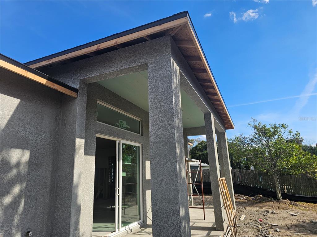 292 Gardenia Road Kissimmee, FL 34743 - Photo 16 of 23 a front view of a house with a yard