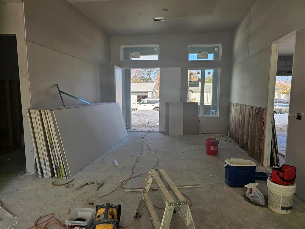 292 Gardenia Road Kissimmee, FL 34743 - Photo 20 of 23 a living room with furniture and a window