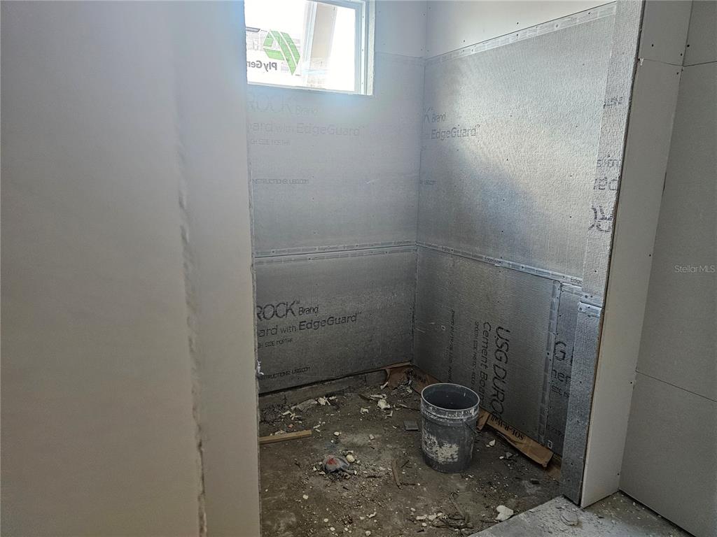 292 Gardenia Road Kissimmee, FL 34743 - Photo 6 of 23 a bathroom with a sink and a toilet