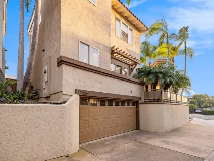 a view of a terrace with chairs and a fire pit