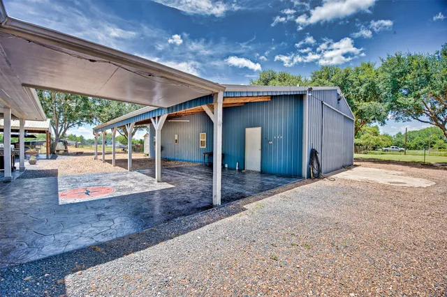a view of a house with a patio