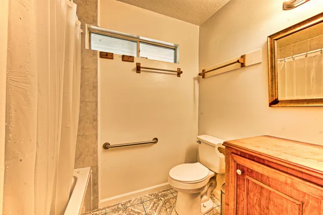 a view of a yard with tree s