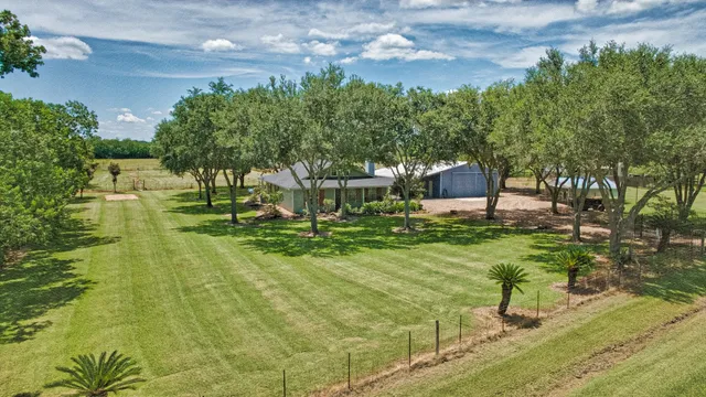a view of yard with small swimming pool