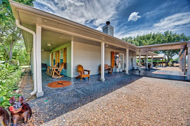 a view of a living room and a porch