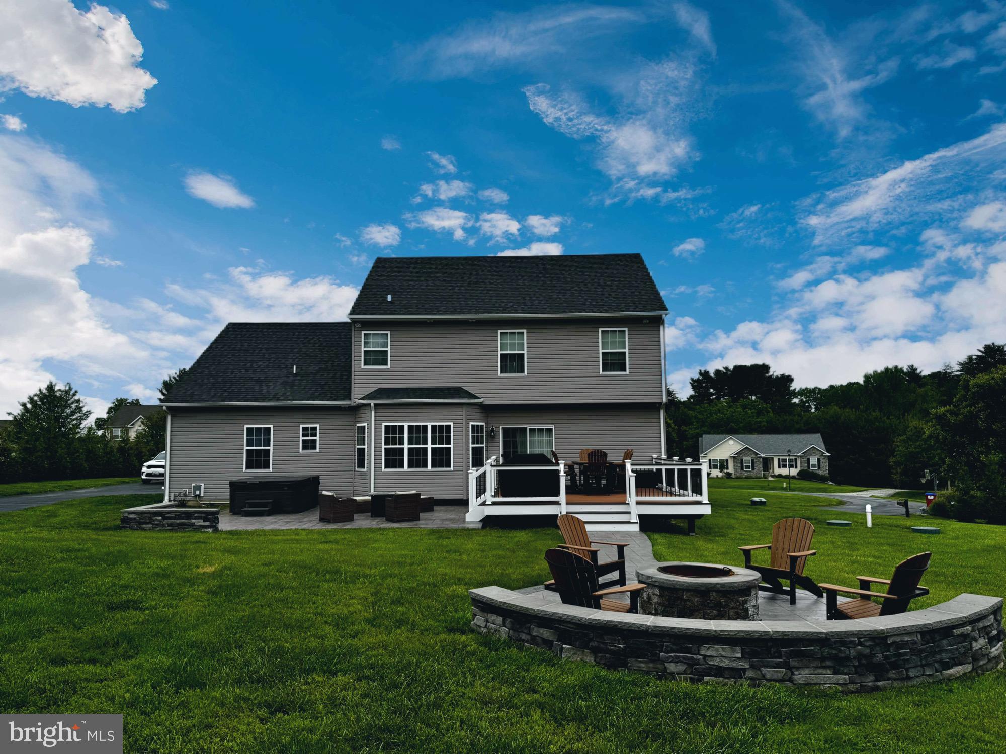 78 Lee Way Elkton, MD 21921 - Photo 34 of 39 a front view of a house with a yard table and chairs