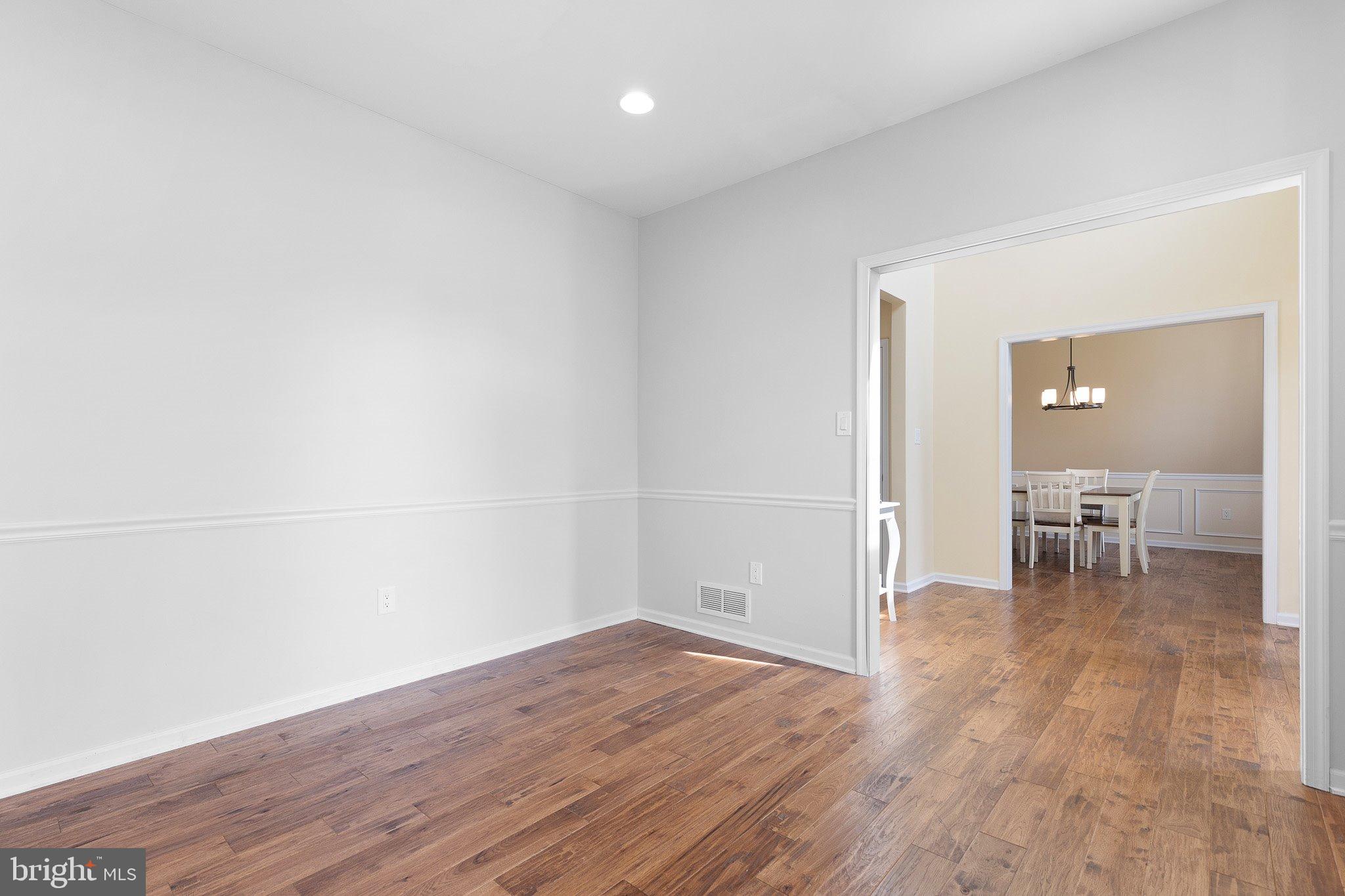 78 Lee Way Elkton, MD 21921 - Photo 8 of 39 a view of room with wooden floor lounge chair and windows