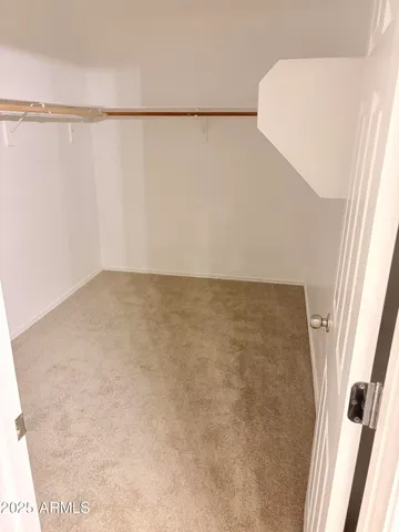 a view of small space with racks on the wall