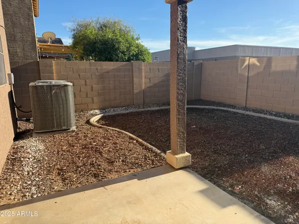 a view of a backyard of the house