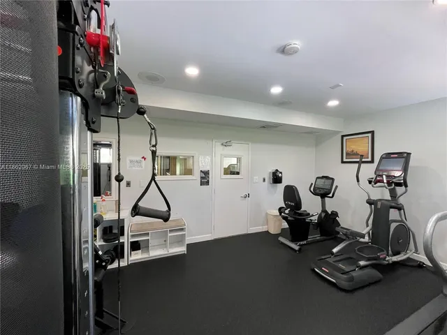 a view of a swimming pool with a yard