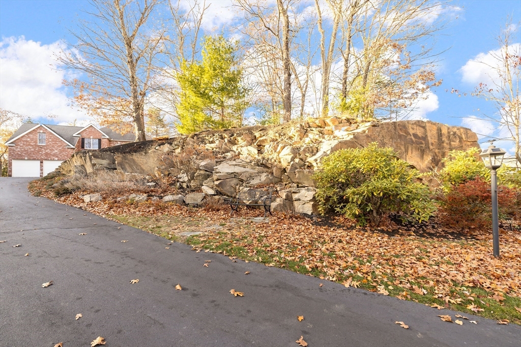 162 Ewald Avenue Marlborough, MA 01752 - Photo 2 of 30 a view of a yard with a tree