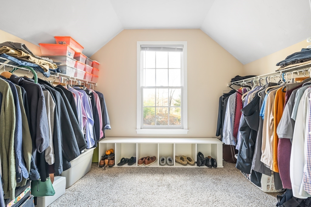 162 Ewald Avenue Marlborough, MA 01752 - Photo 21 of 30 a view of walk in closet with clothes and shoes