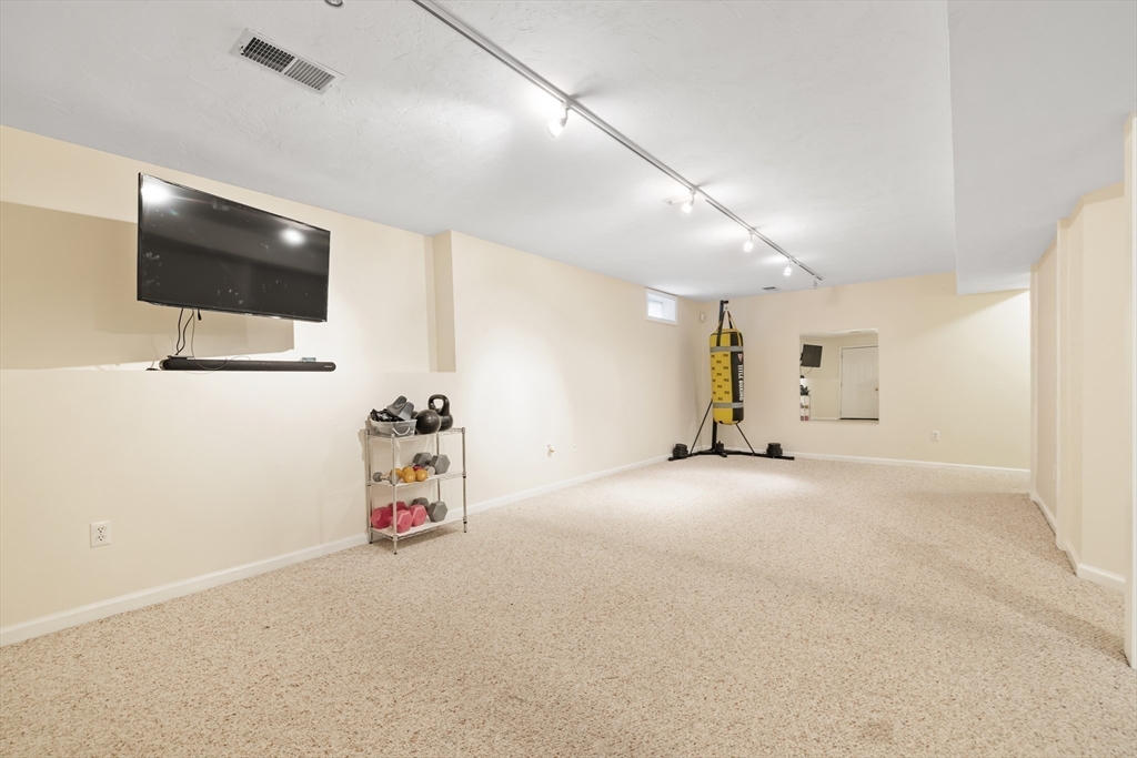 162 Ewald Avenue Marlborough, MA 01752 - Photo 22 of 30 a view of a livingroom with an empty space