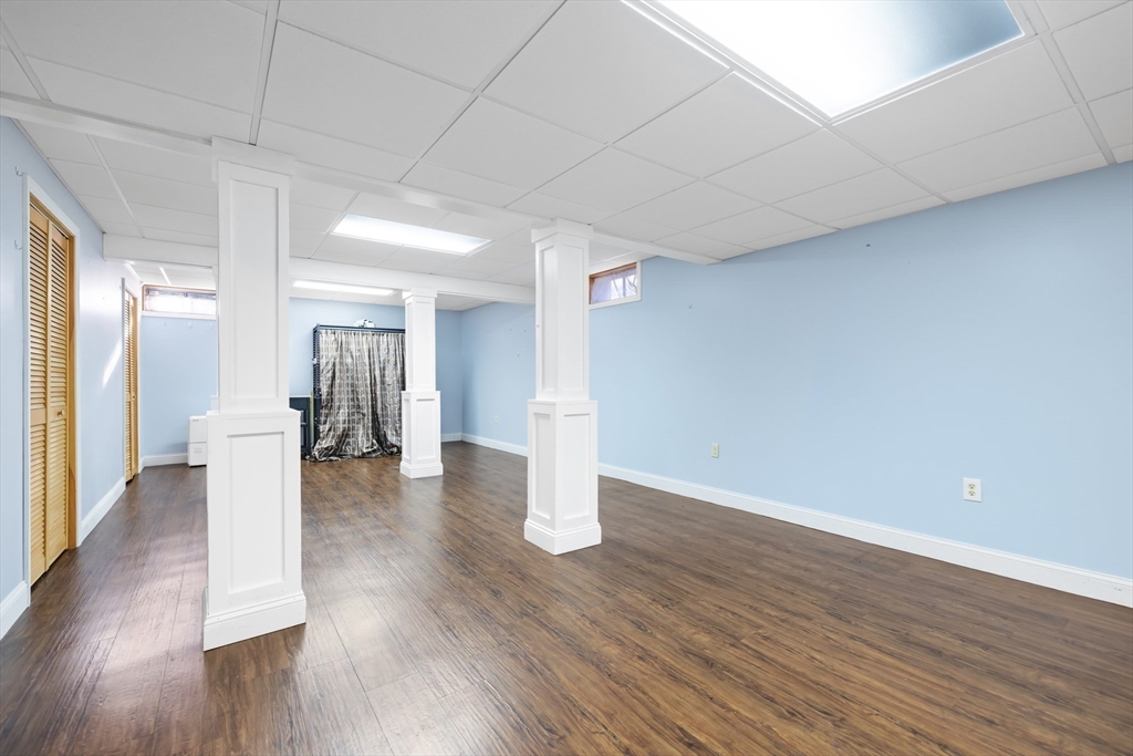 162 Ewald Avenue Marlborough, MA 01752 - Photo 23 of 30 a view of a livingroom with wooden floor