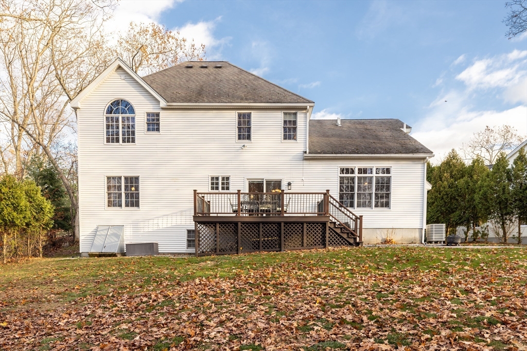 162 Ewald Avenue Marlborough, MA 01752 - Photo 25 of 30 a view of a house with a yard