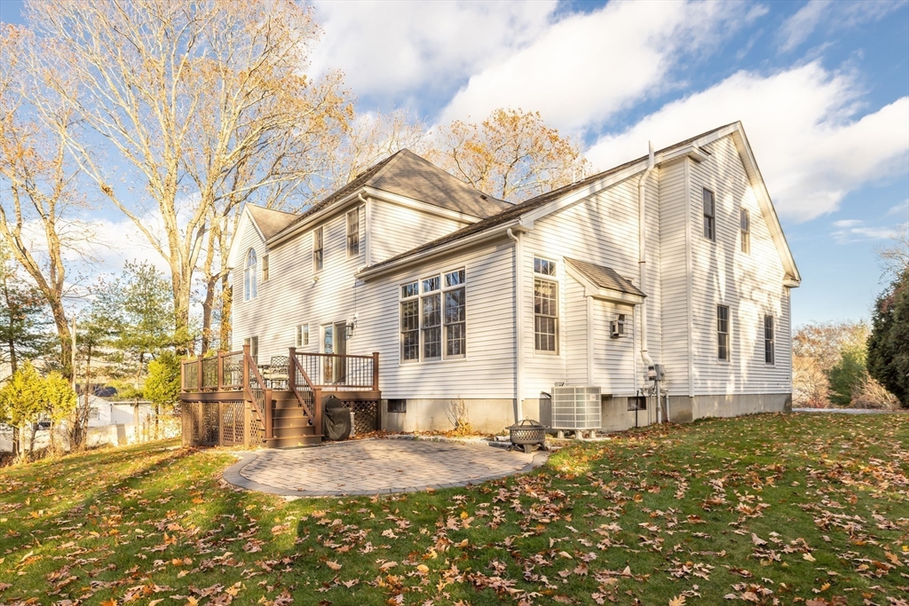 162 Ewald Avenue Marlborough, MA 01752 - Photo 26 of 30 a front view of a house with a yard