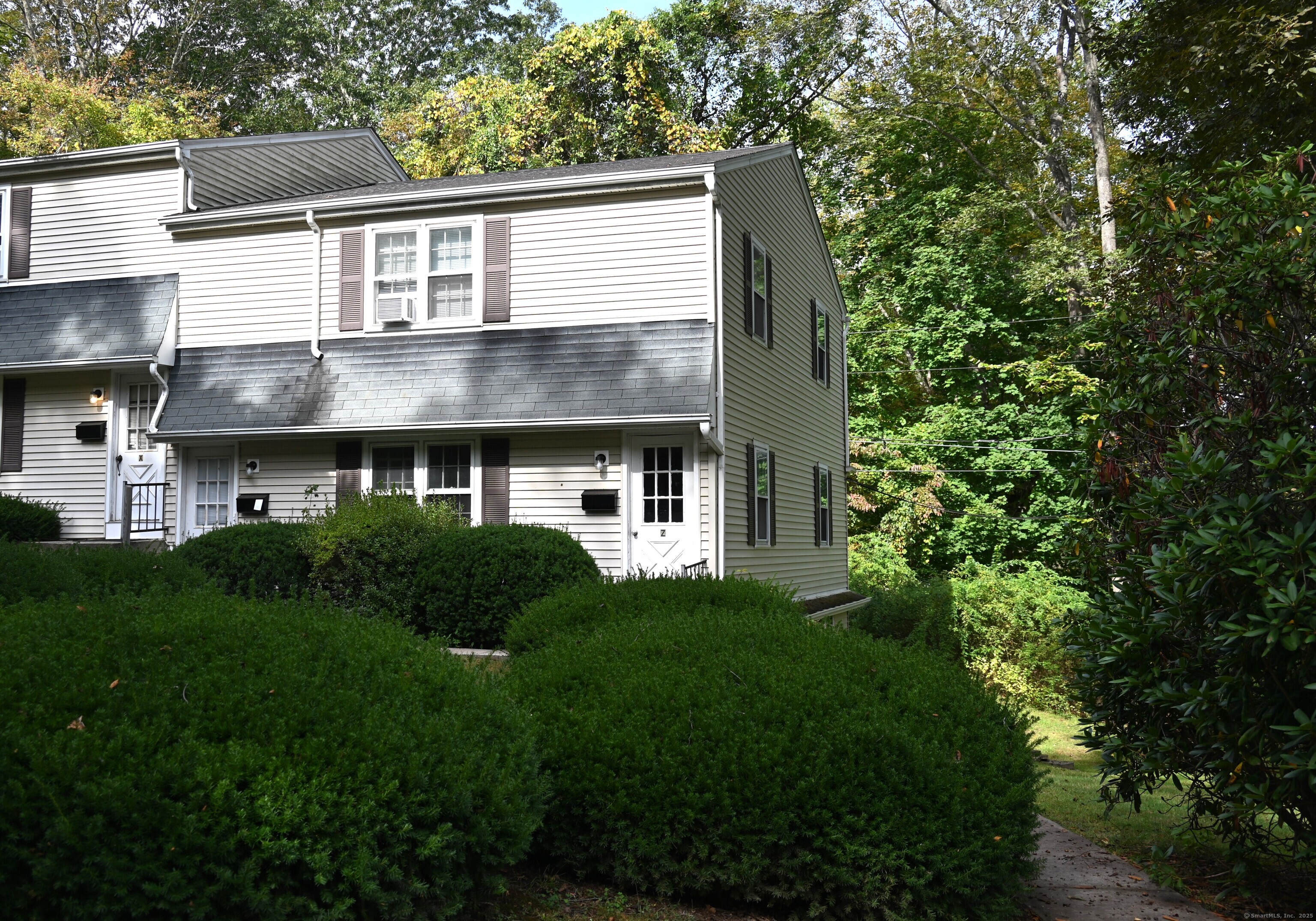 113 Union Street, Unit Z Deep River, CT 06417 - Photo 1 of 14 a front view of a house with a yard