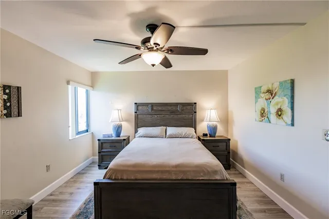 a bedroom with a bed and dresser