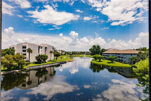 an aerial view of a house with yard swimming pool and outdoor seating