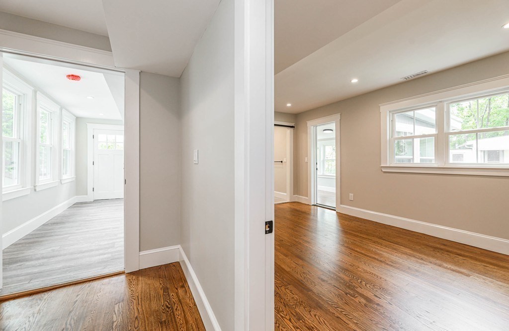 52 Maple Street, Unit 2 Boston, MA 02136 - Photo 18 of 41 wooden floor in an empty room with a window